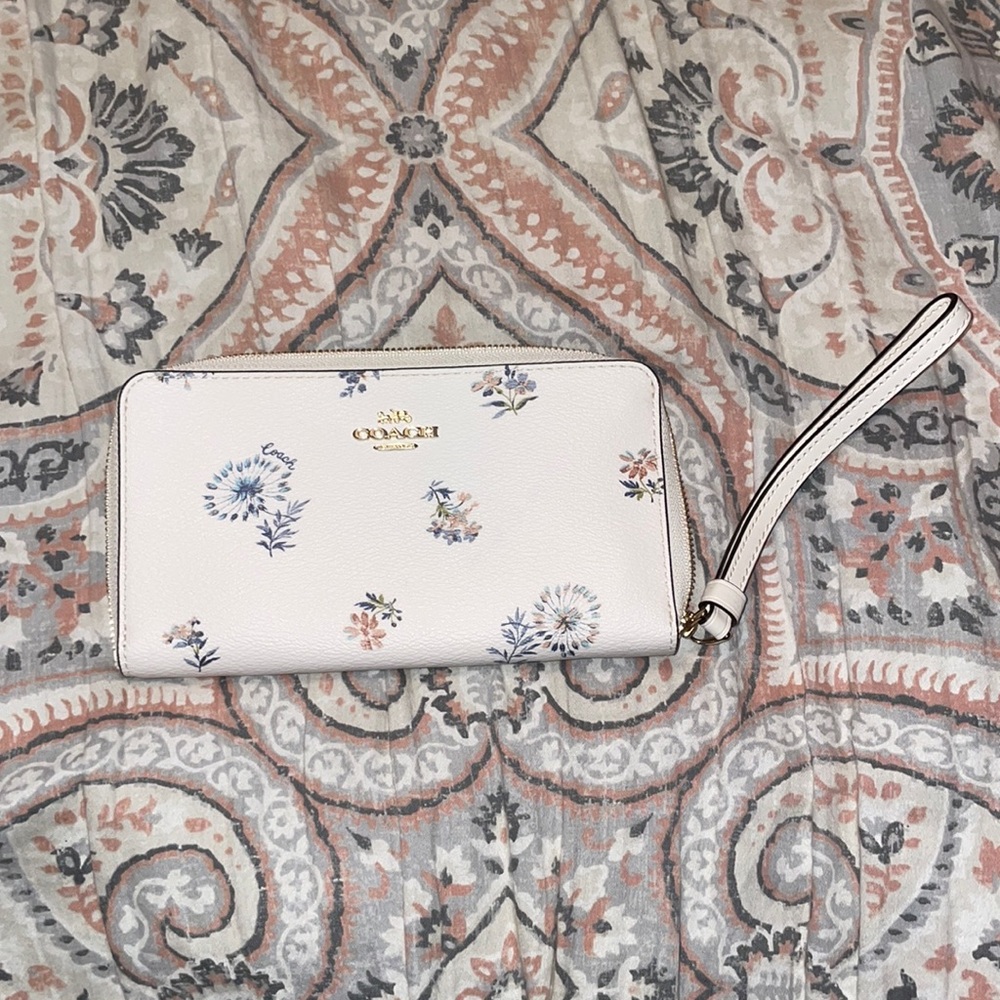 coach floral clutch